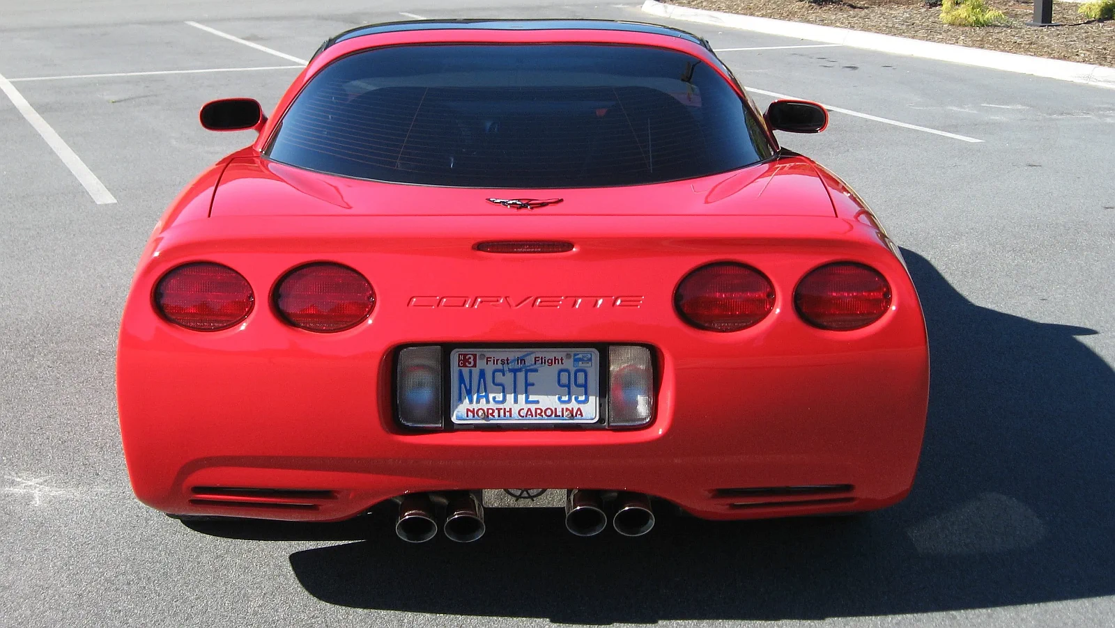Click to Enlarge-Esc to Close Corvette Generations/C5/C5 1999 Red Rear Chevrolet-Corvette.webp